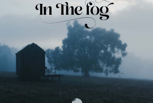 Mossbeard - In the fog, album cover depicting a tiny house and a big oak tree silhouettes appearing through the fog and mist.